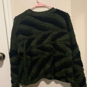 Green and black sweater